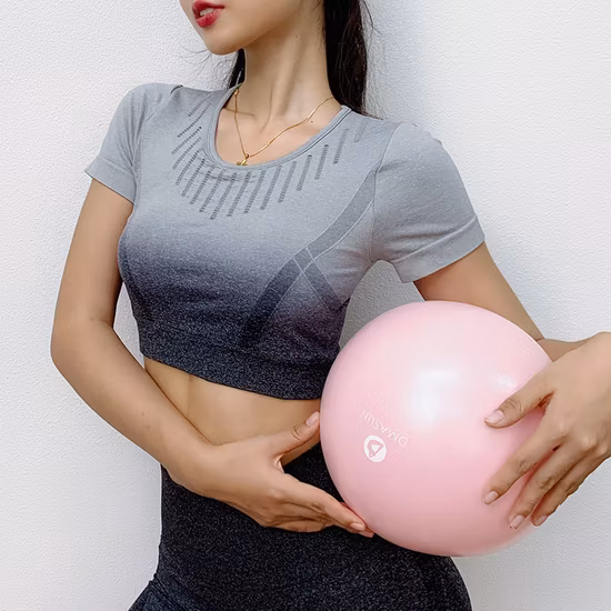 Ribbed Seamless Color Changed Sports Bra Women′s Workout Gym Clothing Crop Top Short Sleeve with Pad